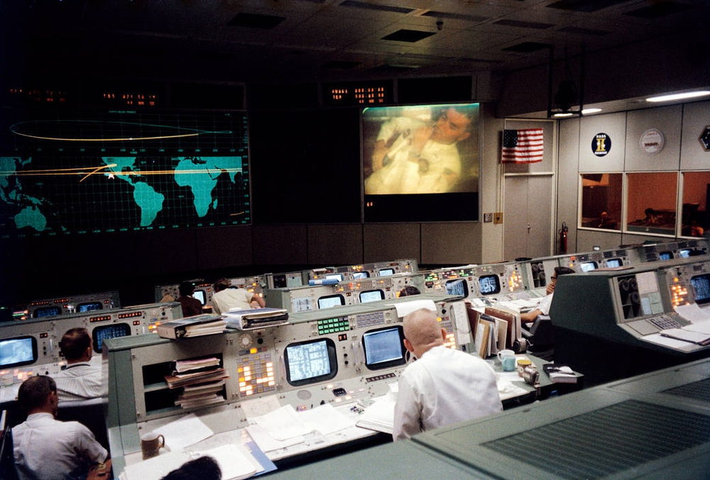 Flight controllers at consoles in the Apollo 13 mission control room in Houston in 1970